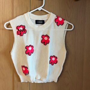 Cider 90s sweater vest with cartoon flowers